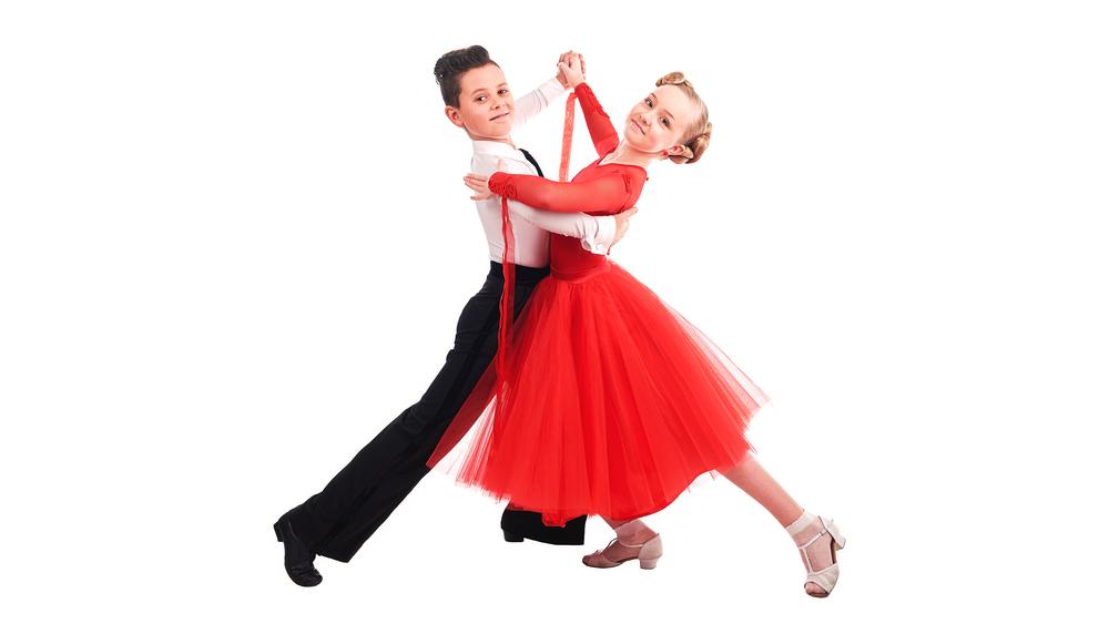 Lovely little boy and girl dancing.